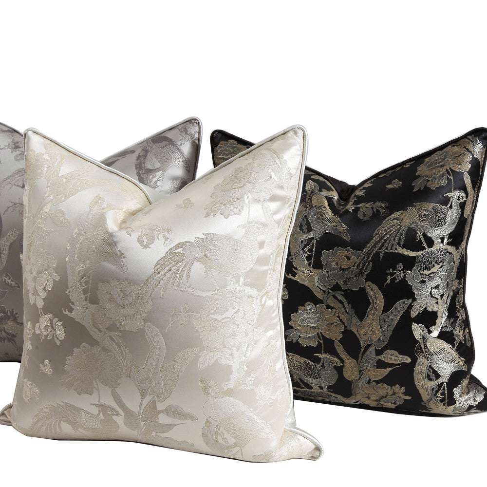 Chinese style satin plant pattern throw pillows on model room living room sofa