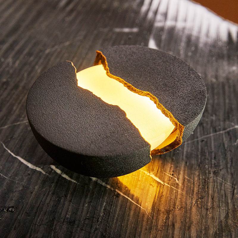 Sculpture ambience light Bluetooth speaker with cast resin shell and rechargeable battery