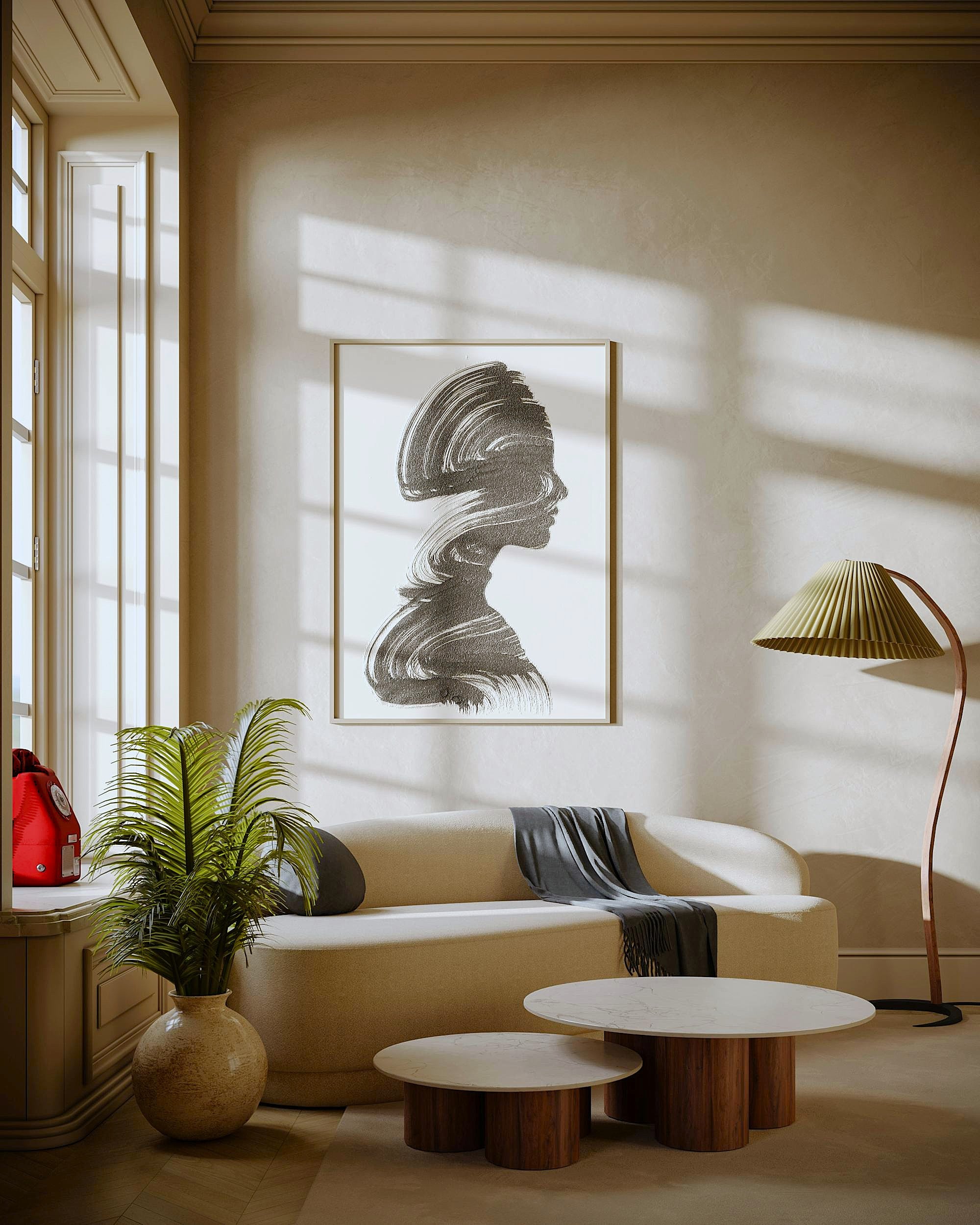 Modern living room with a beige sofa, round coffee table, and abstract art on the wall.